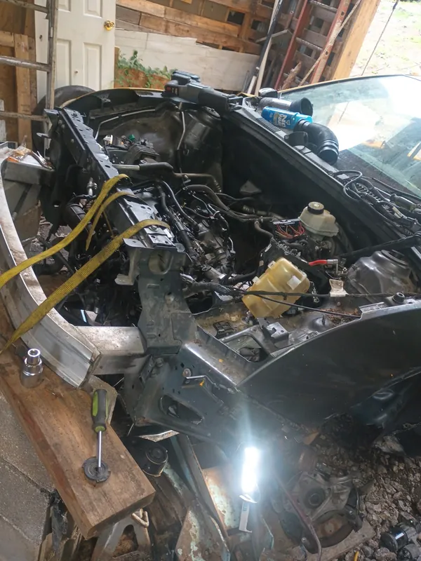 Front end taken apart for engine access