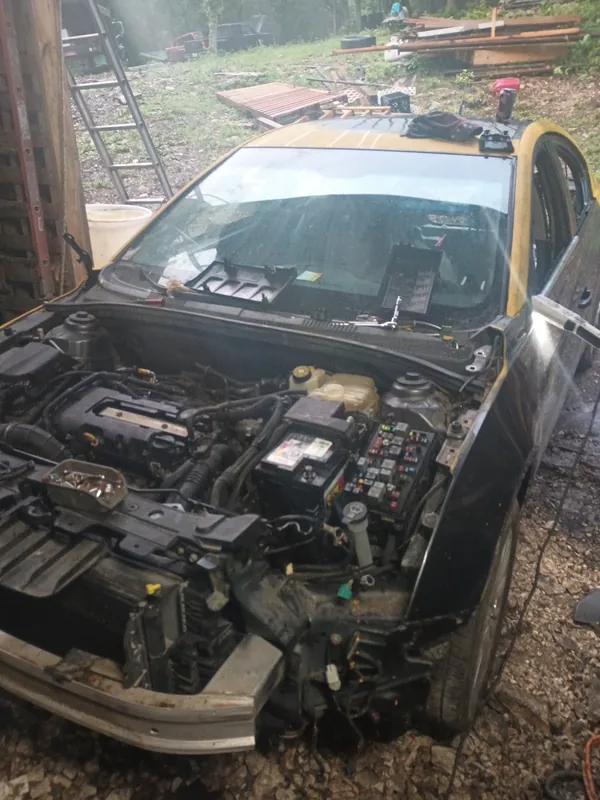 Car with the front end removed for repair